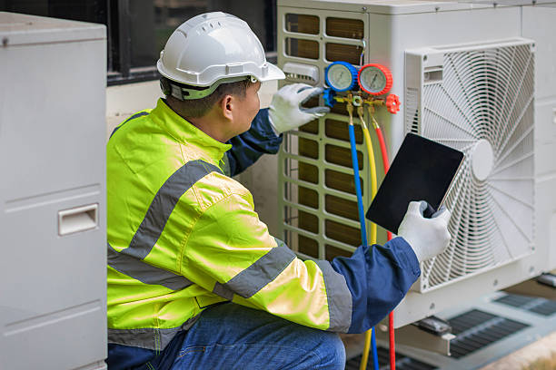 Professional Ac Installation technician working in Byfield, MA